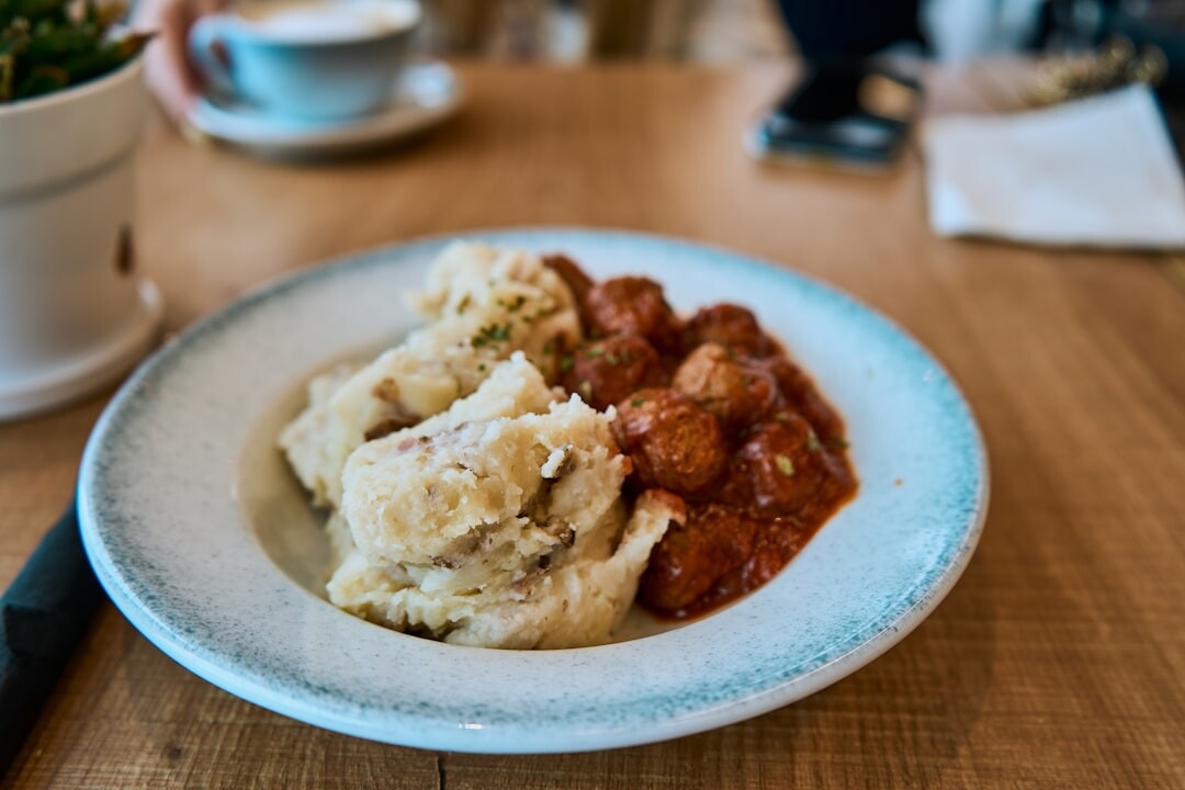 Traditional Czech svickova with dumplings on a plate